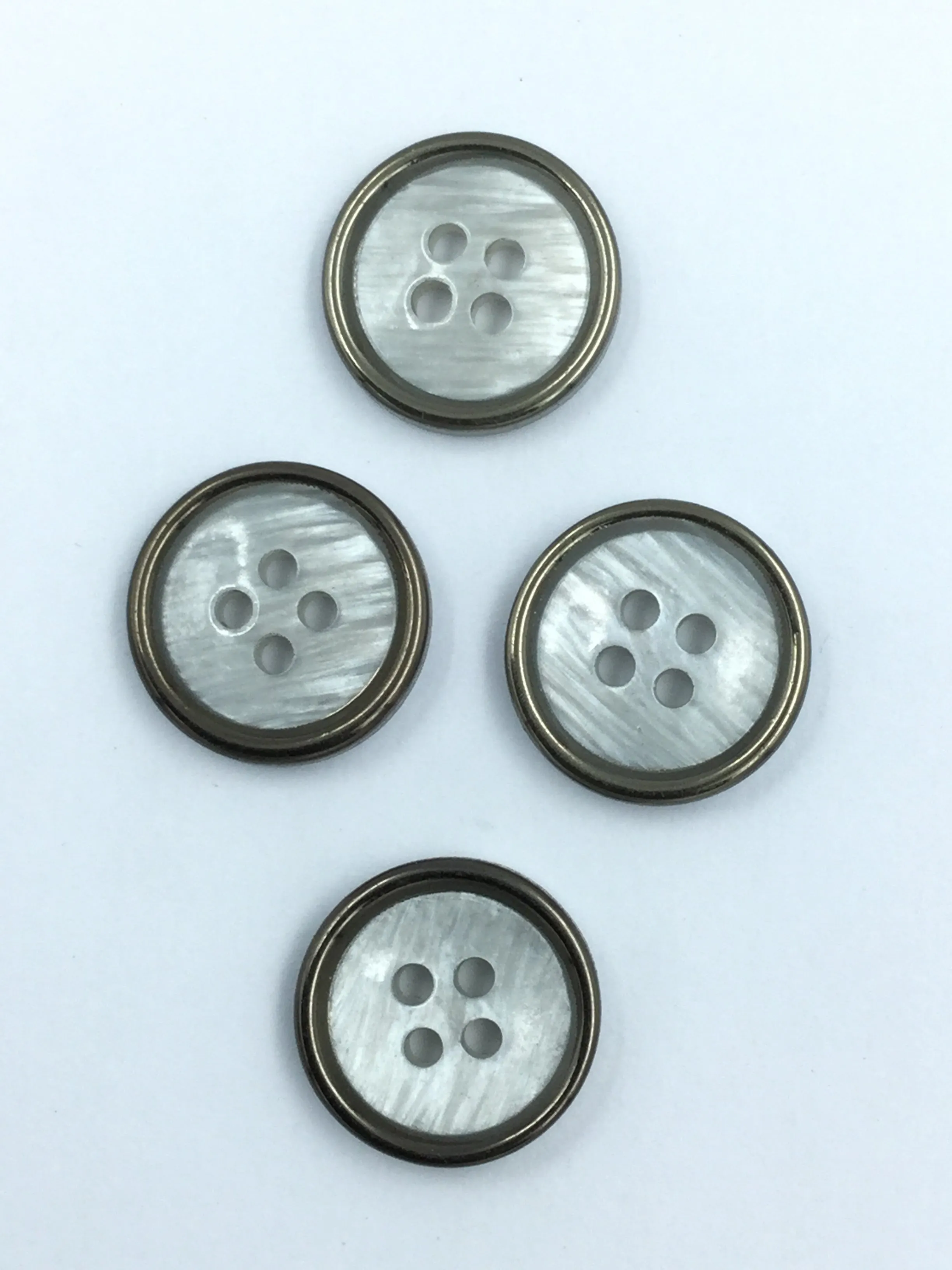 White Circular Plastic Shirt Buttons